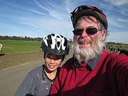 Lily and Granddad on mountain bikes